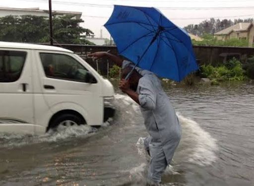 Surviving Lekki flood - how to get to work without staining your suit